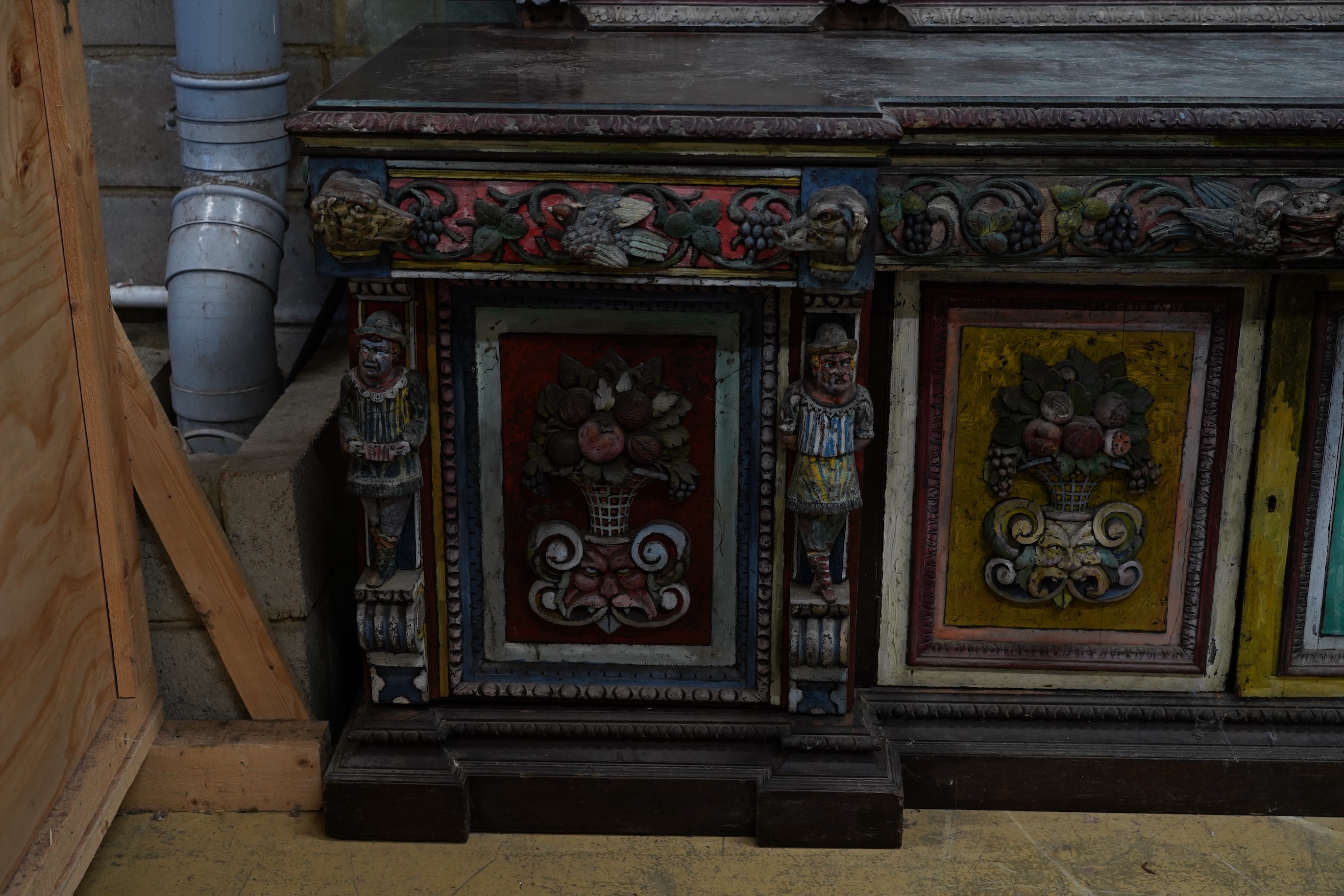 John Bratby (1928-1992): A monumental mirror backed buffet sideboard, polychrome decorated by the artist